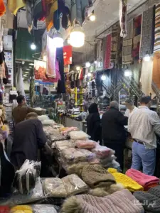 مردم در حال خرید در پاساژ اقبال بازار