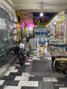موتور و چرخ در درون پاساژ حسن‌نژاد بازار